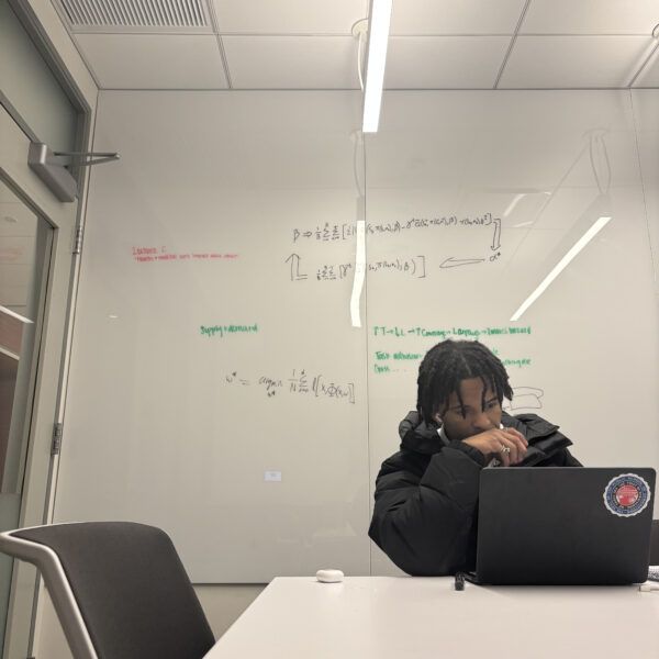 Joshua Wangia takes AI passion from Upper School to college