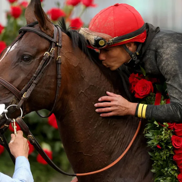 Derby fans captivate the media with flower headpieces